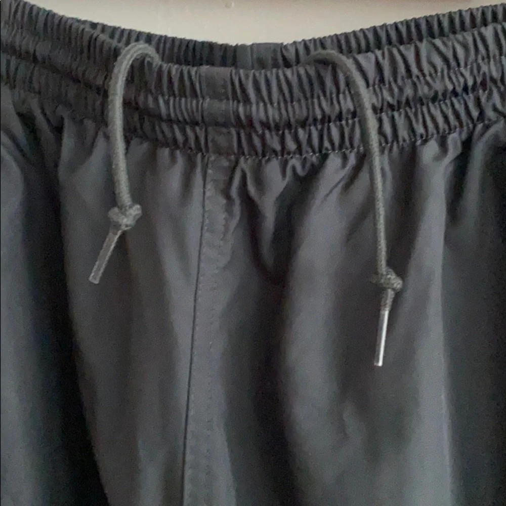Nike dark grey windbreaker pants